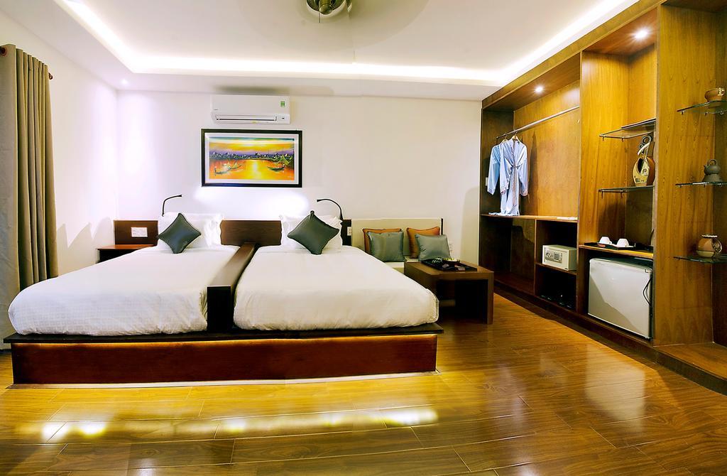 Hotel Azumi Hoi An Habitación foto
